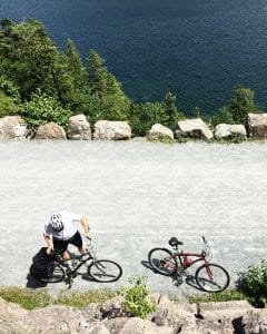 Cyclist taking a stop on a dirt path
