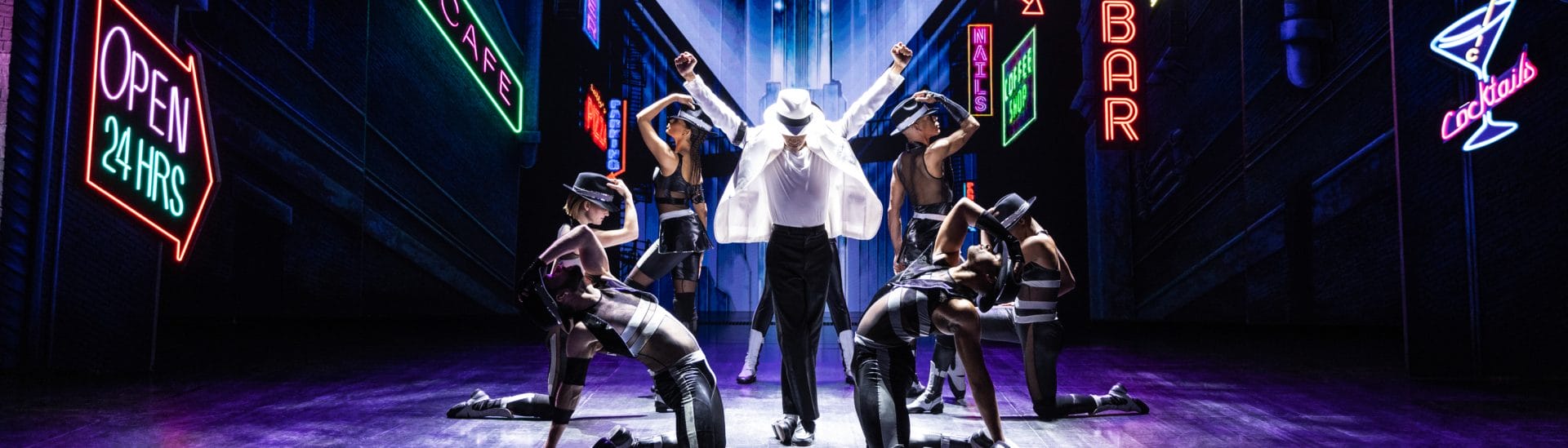 Actors from MJ on stage.
