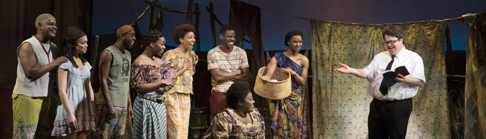 Actors from The Book of Mormon on stage.