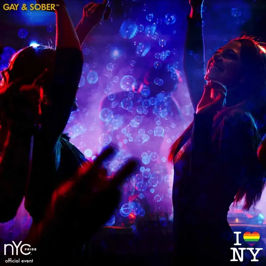 People dancing with bubbles around them