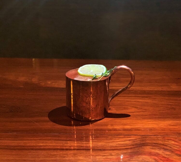 Cocktail in a copper cup.