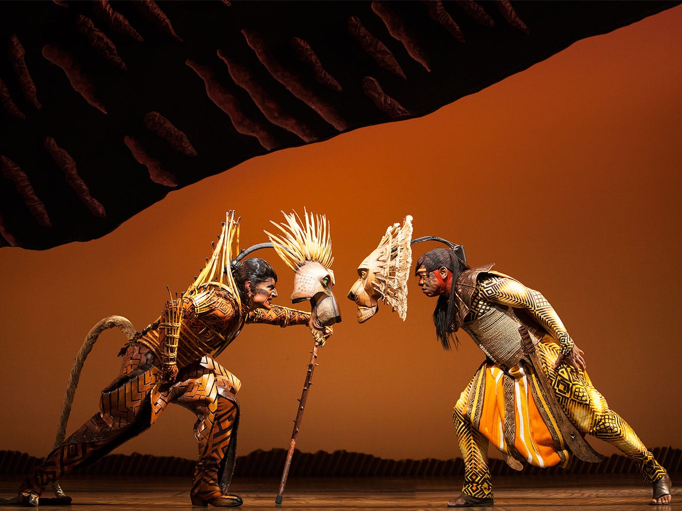Performers for The Lion King broadway show on stage. 