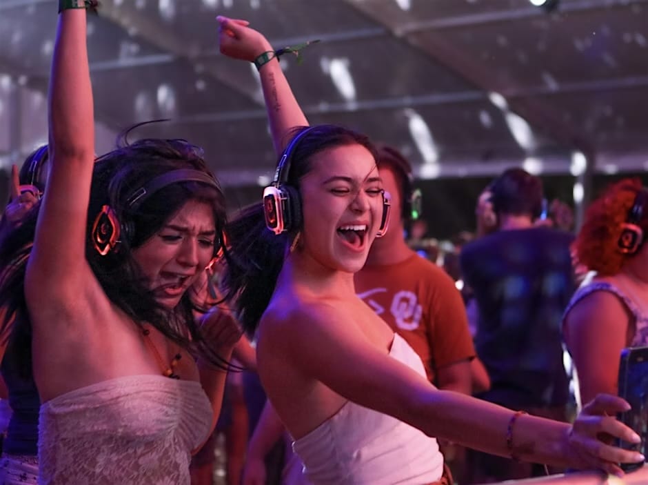 People dancing at Silent Disoc, wearing headphones