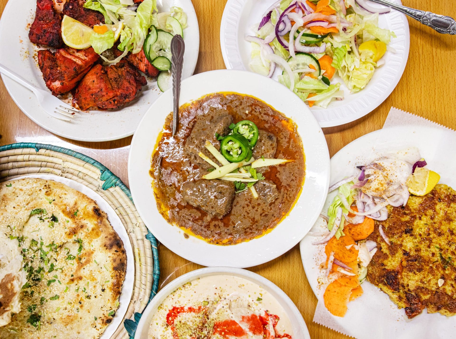 Kababish is a neighborhood favorite in Jackson Heights, celebrated for diverse offerings like flavorful seekh kababs and tender chicken tikka paired with freshly baked naan.
