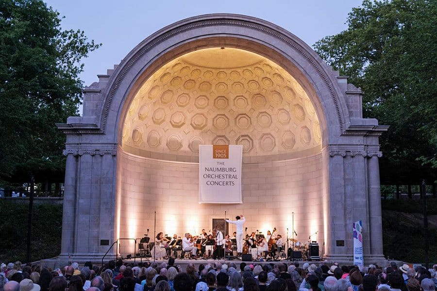 Naumburg Bandshell with the Naumburg Orchestra and a crowd. 
