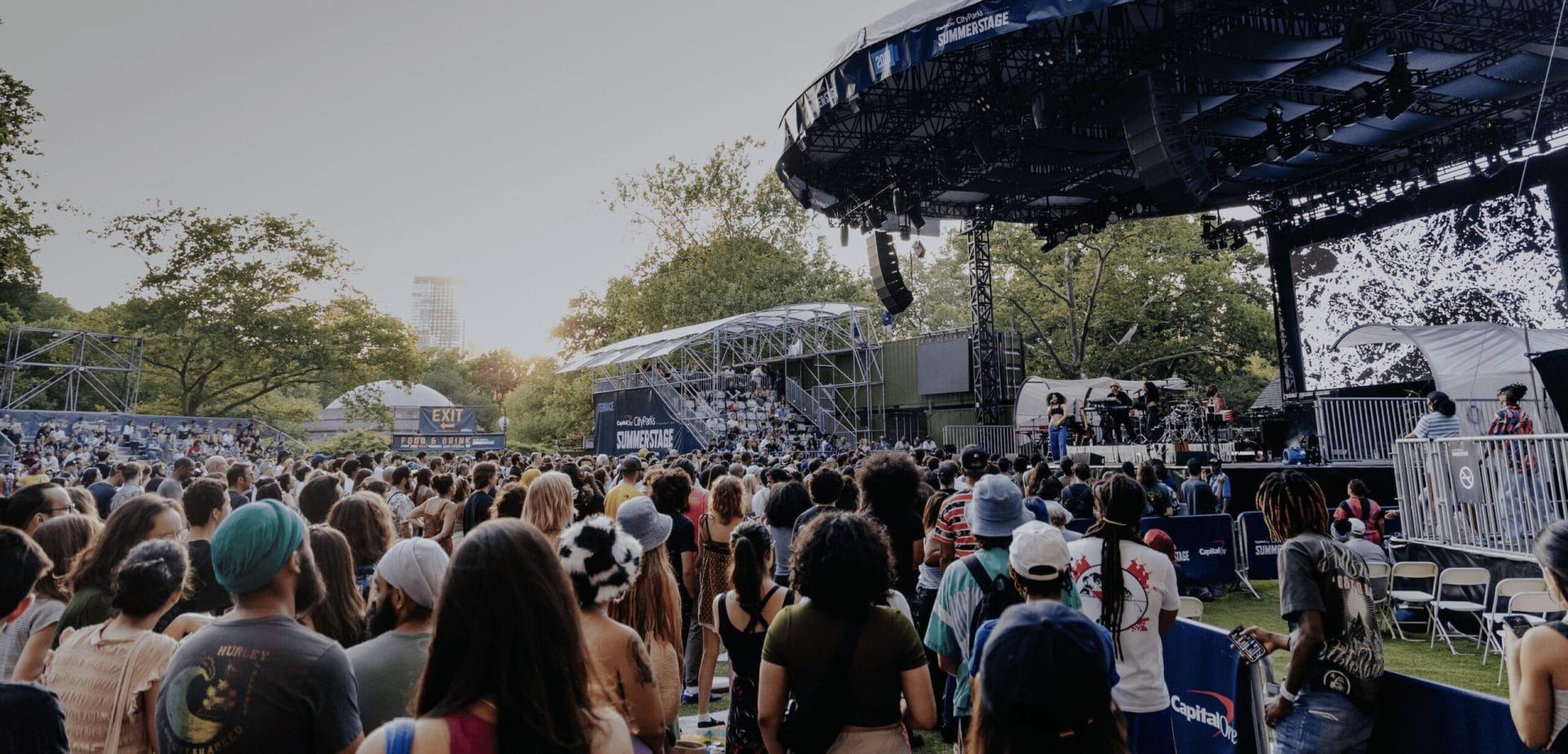 People gathered at a stage performance at SummerStage