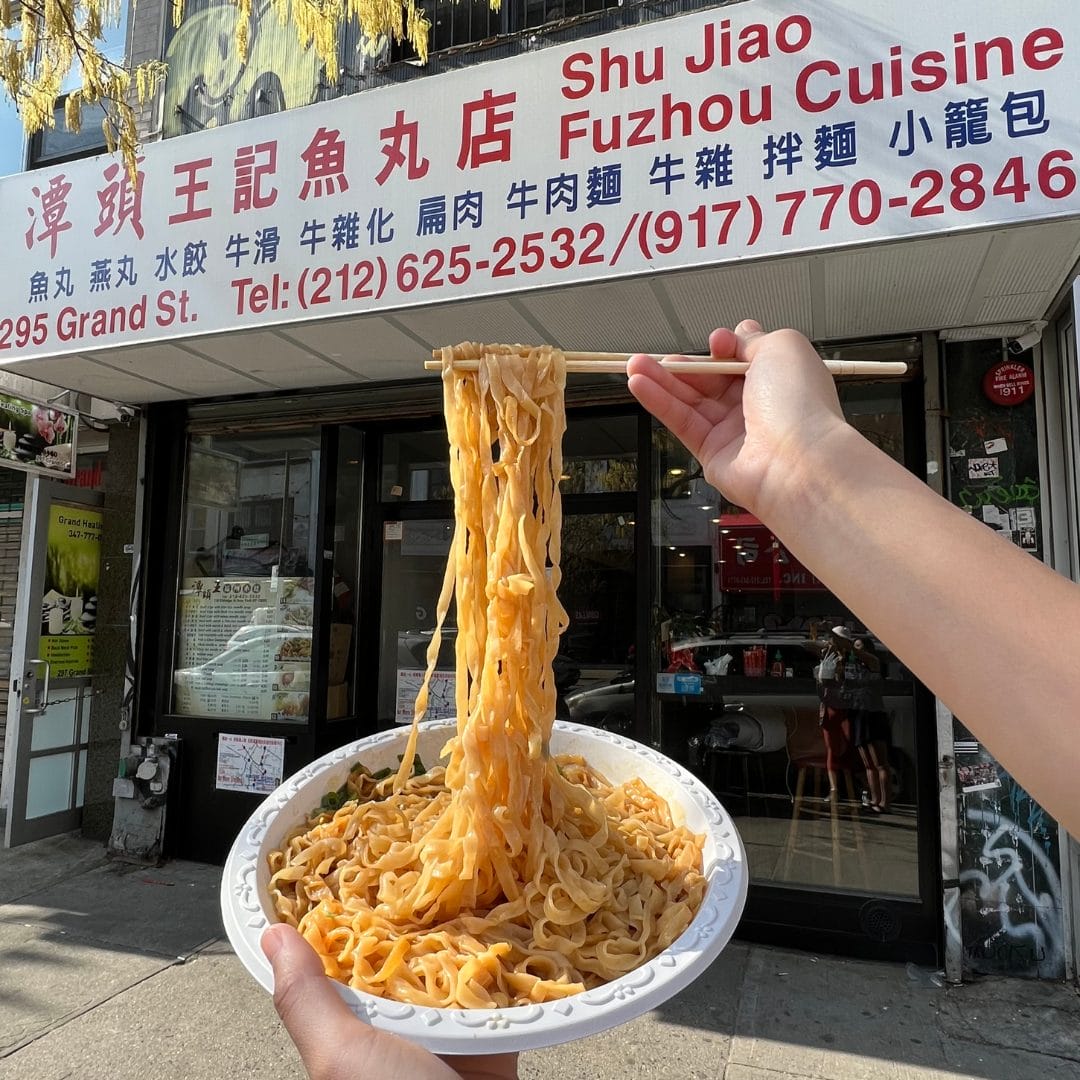 Dish posed in front of a Chinatown restaurant