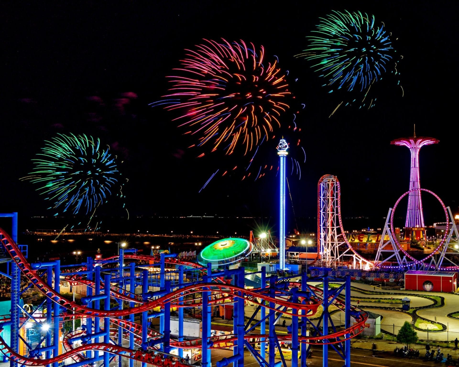 Birds view of Luna Park with firworks in the night sky.
