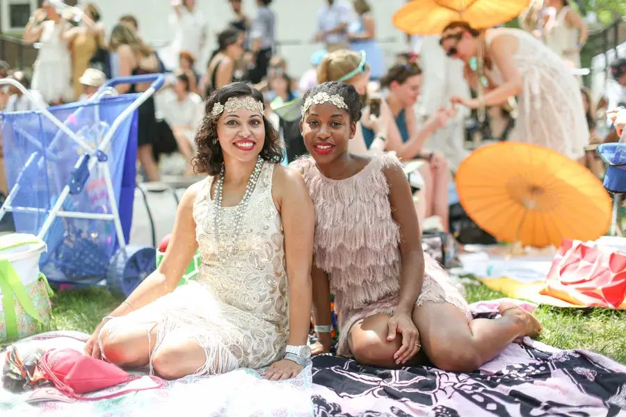 People dressed in 1920's attire for the Jazz Age Lawn Party