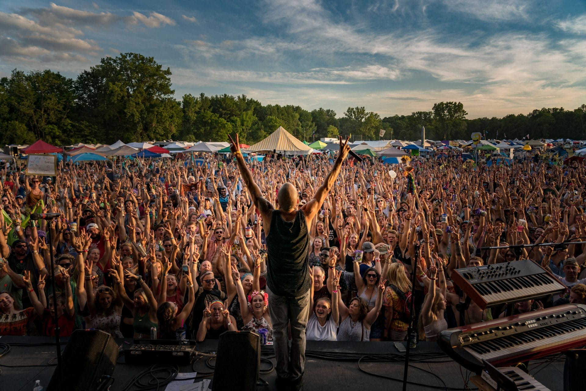 People gathered around a stage during a performance at the GrassRoots festival
