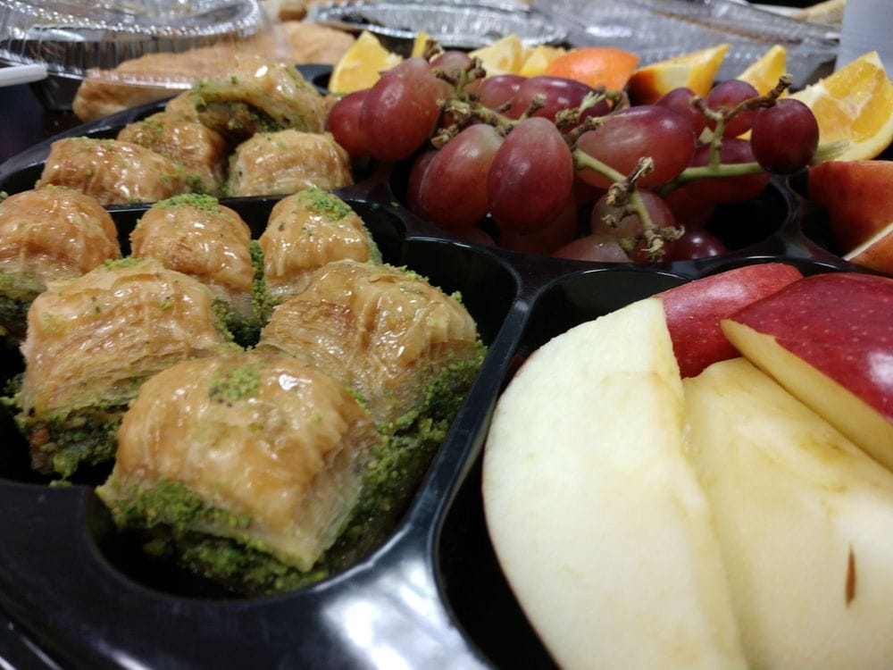 Baklava assortment on black plate