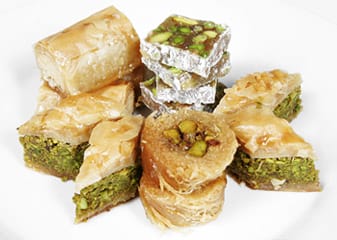 Baklava assortment on white plate
